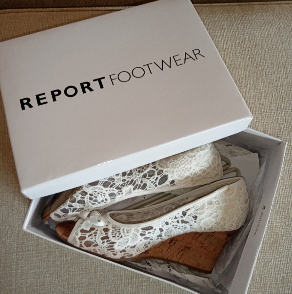 Report white lace wedges